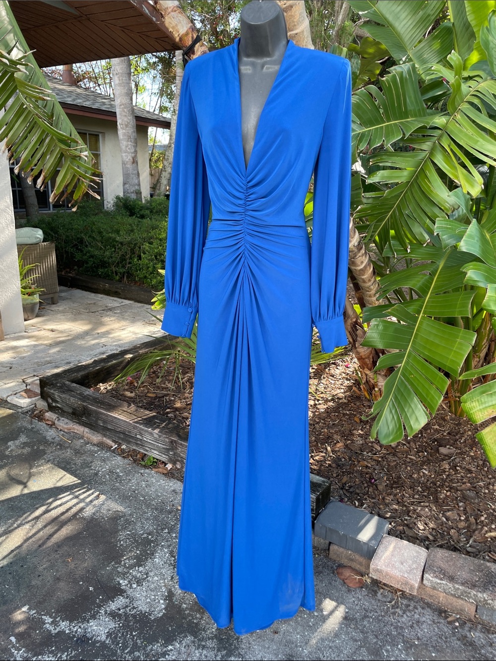 cerulean blue ruched, maxi with shoulder pads and train
